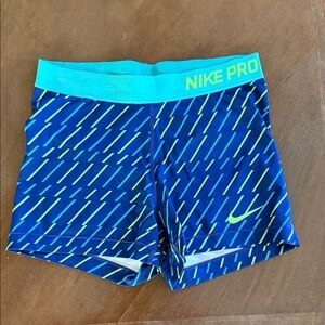 Nike Pro Blue Shorts with Green Accents